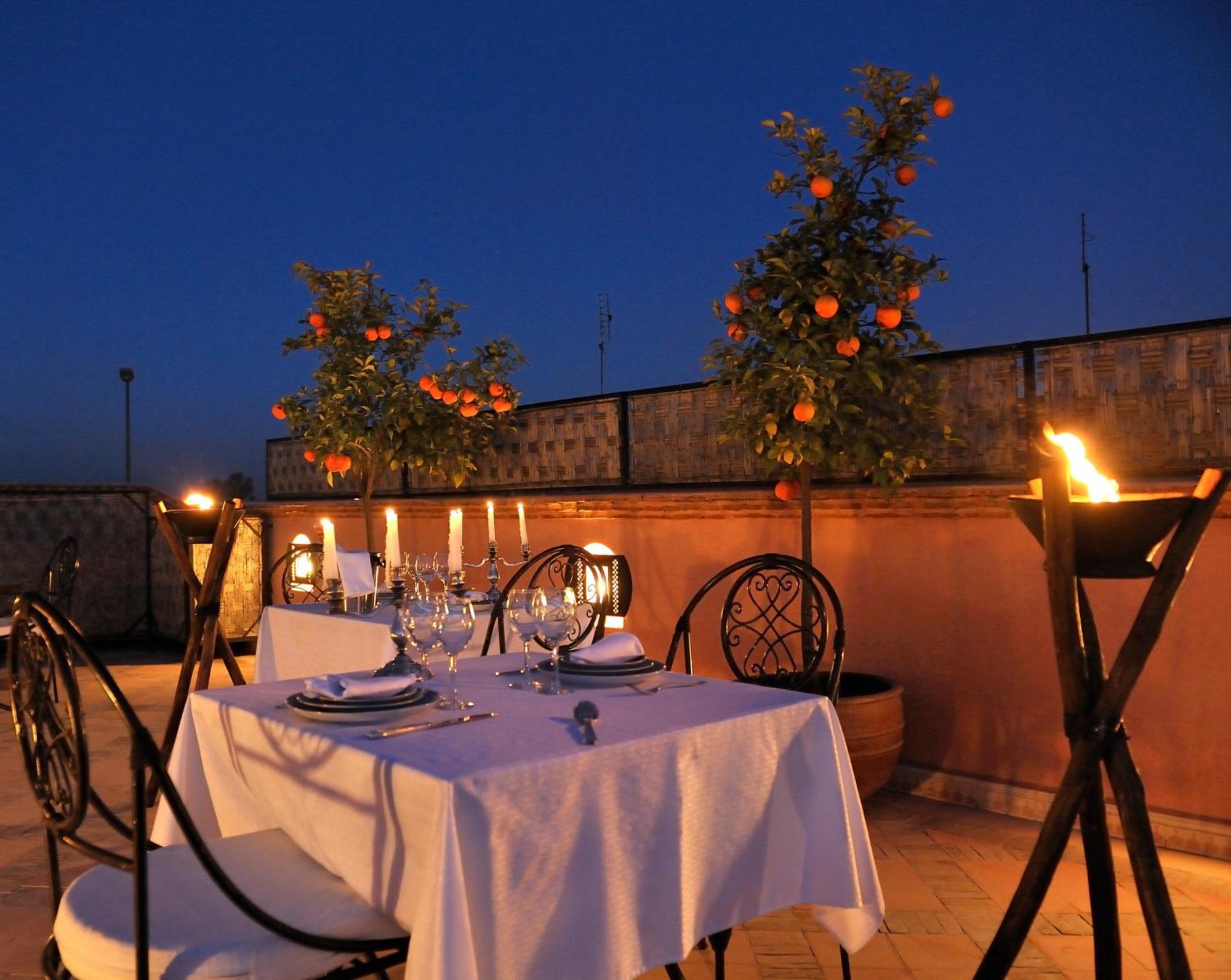 Riad Le Jardin D'Abdou Marrakesh Exterior photo Rooftop dining at the hotel